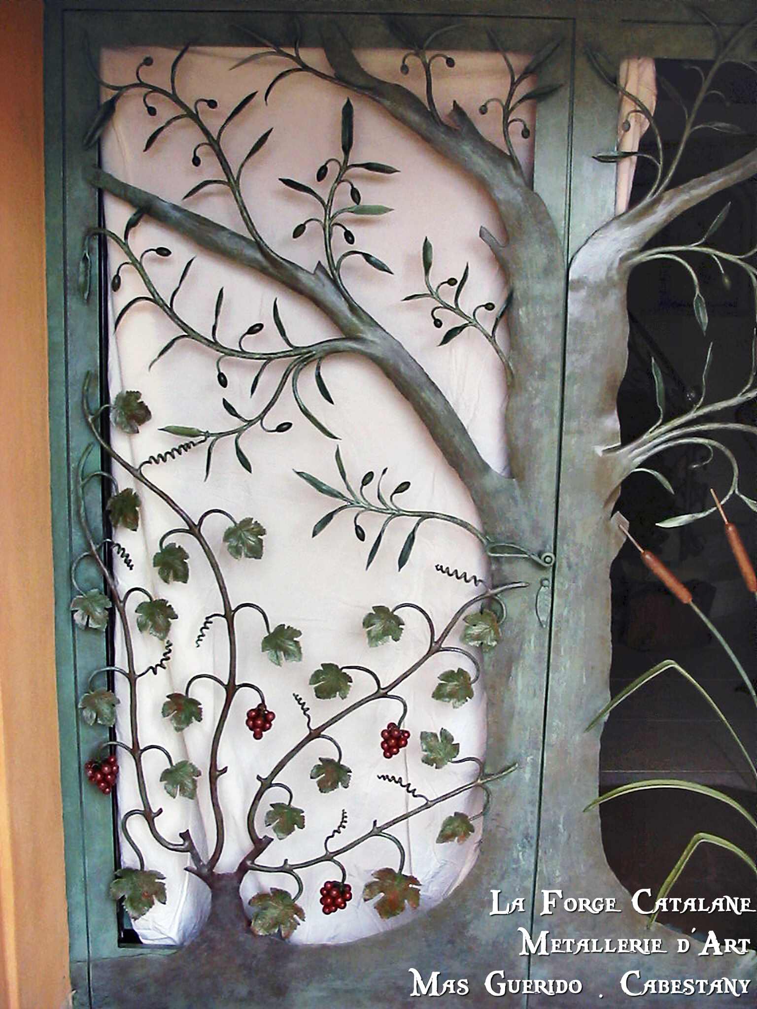 porte vegetale travail forge forge catalane 4.jpg